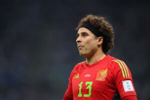 LUSAIL CITY, QATAR - NOVEMBER 26: Guillermo Ochoa of Mexico reacts during the FIFA World Cup Qatar 2022 Group C match between Argentina and Mexico at Lusail Stadium on November 26, 2022 in Lusail City, Qatar. (Photo by Alex Grimm/Getty Images)