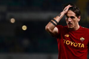 AS Romas Italian forward Nicolo Zaniolo gestures during the warm up prior the Italian Serie A football match between Hellas Verona and AS Roma at the Marcantonio Bentegodi Stadium in Verona on October 31, 2022. (Photo by MARCO BERTORELLO / AFP) (Photo by MARCO BERTORELLO/AFP via Getty Images)