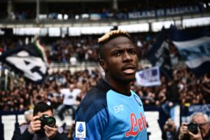 Napoli's Nigerian forward Victor Osimhen reacts after scoring his side's third goal during the Italian Serie A football match between Torino and Napoli on March 19, 2023 at the Olympic stadium in Turin. (Photo by Marco BERTORELLO / AFP) (Photo by MARCO BERTORELLO/AFP via Getty Images)