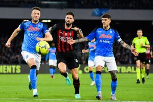 (From L) Napoli's Kosovan defender Amir Rrahmani, AC Milan's French forward Olivier Giroud and Napoli's Italian defender Giovanni Di Lorenzo go for the ball during the Italian Serie A football match between SSC Napoli and AC Milan on April 2, 2023 at the Diego-Maradona stadium in Naples. (Photo by Tiziana FABI / AFP) (Photo by TIZIANA FABI/AFP via Getty Images)