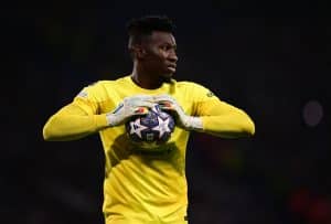 Inter Milan's Cameroonian goalkeeper #24 Andre Onana holds onto the ball during the UEFA Champions League final football match between Inter Milan and Manchester City at the Ataturk Olympic Stadium in Istanbul, on June 10, 2023. (Photo by Marco BERTORELLO / AFP) (Photo by MARCO BERTORELLO/AFP via Getty Images)