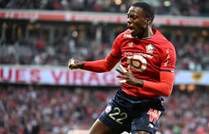 TOPSHOT - Lille's forward Timothy Weah celebrates after scoring a first goal during the French L1 football match between Lille OSC and Stade Rennais (Rennes) at Stade Pierre-Mauroy in Villeneuve-d'Asq, northern France on May 21, 2022. (Photo by DENIS CHARLET / AFP) (Photo by DENIS CHARLET/AFP via Getty Images)